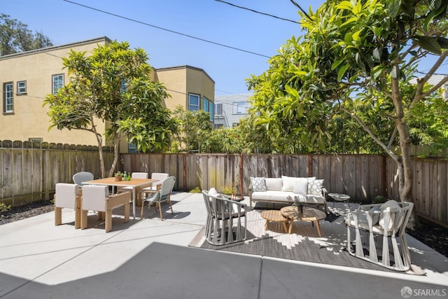 867 33rd Ave, San Francisco, CA 94121 - fenced backyard with an outdoor hangout area, outdoor dining area, and a patio area