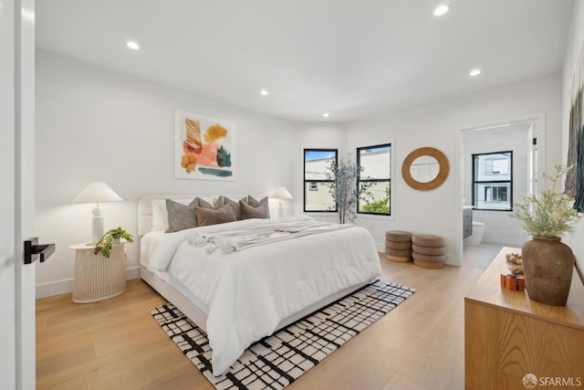 867 33rd Ave, San Francisco, CA 94121 - bedroom featuring recessed lighting, light wood-style floors, connected bathroom, and baseboards