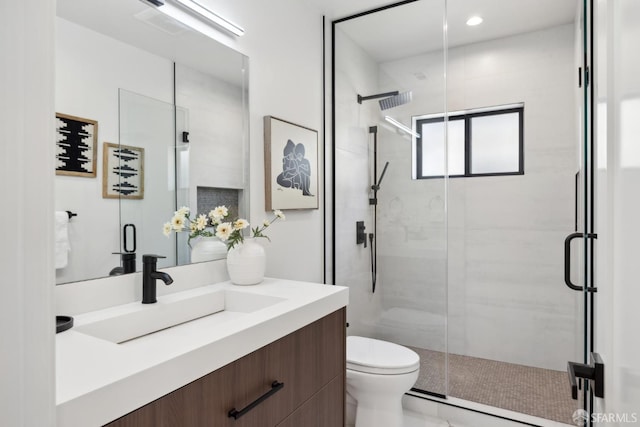 867 33rd Ave, San Francisco, CA 94121 - full bath with toilet, vanity, a shower stall, and recessed lighting