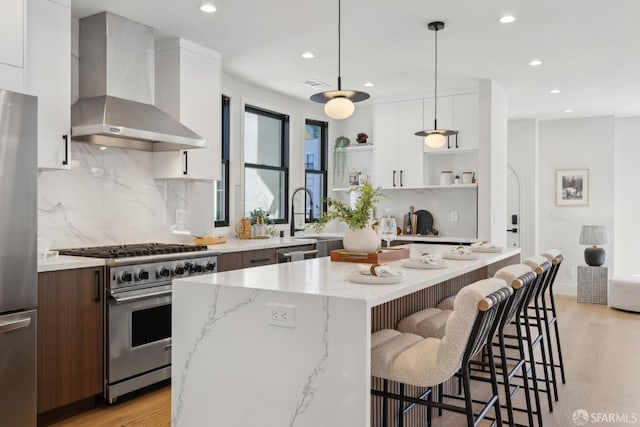 867 33rd Ave, San Francisco, CA 94121 - kitchen featuring stainless steel appliances, wall chimney exhaust hood, modern cabinets, open shelves, and recessed lighting