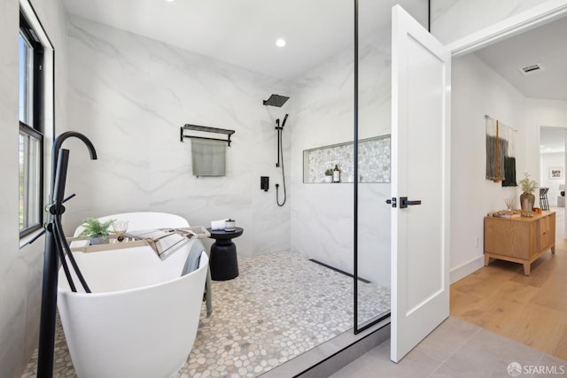 867 33rd Ave, San Francisco, CA 94121 - full bathroom featuring a marble finish shower, a soaking tub, vanity, and recessed lighting
