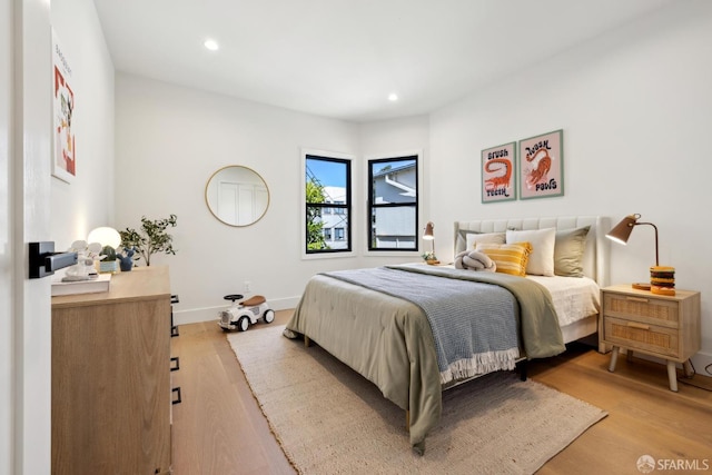 867 33rd Ave, San Francisco, CA 94121 - bedroom featuring recessed lighting, light wood-style flooring, and baseboards