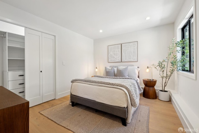 867 33rd Ave, San Francisco, CA 94121 - bedroom featuring light wood finished floors, recessed lighting, and baseboards
