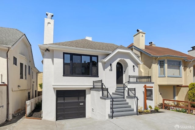 867 33rd Ave, San Francisco, CA 94121 - view of front of house featuring an attached garage, a chimney, stucco siding, and concrete driveway
