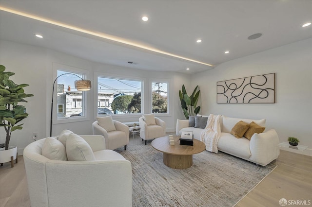 living room with light hardwood / wood-style flooring