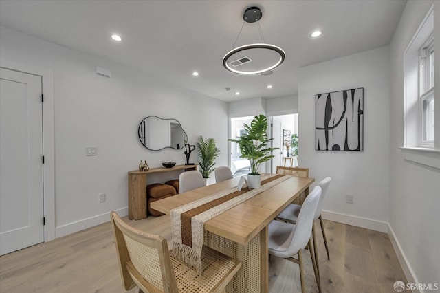 dining room featuring light wood-type flooring