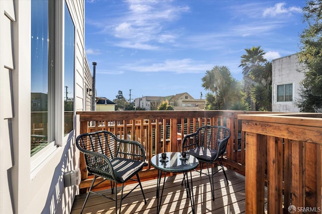 wooden balcony with a wooden deck