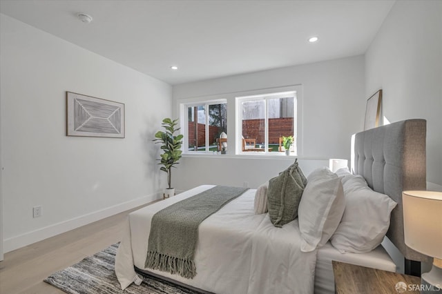 bedroom featuring light hardwood / wood-style floors