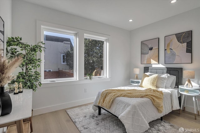 bedroom featuring hardwood / wood-style flooring