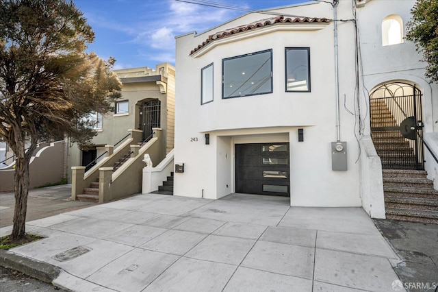 view of front of property with a garage