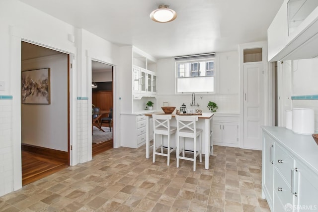 dining area with stone finish floor