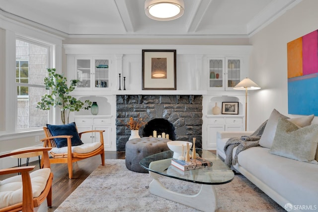 630 9th Ave, San Francisco, CA 94118 - living area with wood finished floors, beam ceiling, ornamental molding, and a stone fireplace