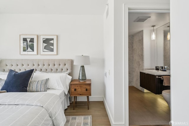 2299 Market St Unit 503, San Francisco, CA 94114 - bedroom with wood finished floors and a sink