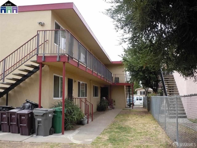 view of property exterior featuring a balcony