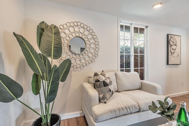 718 Whipple Ave, Redwood City, CA 94063 - living area featuring baseboards, wood finished floors, and crown molding