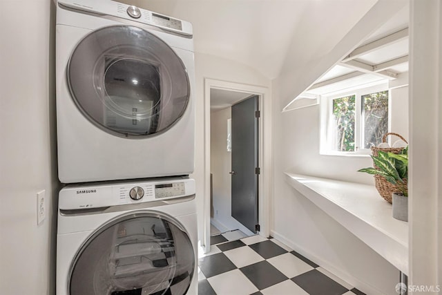 718 Whipple Ave, Redwood City, CA 94063 - laundry room with stacked washer / dryer, tile patterned floors, and baseboards