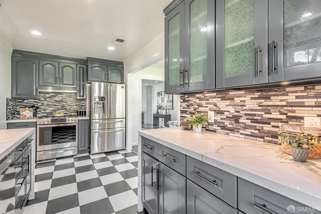 718 Whipple Ave, Redwood City, CA 94063 - kitchen featuring appliances with stainless steel finishes, dark floors, under cabinet range hood, glass insert cabinets, and gray cabinetry