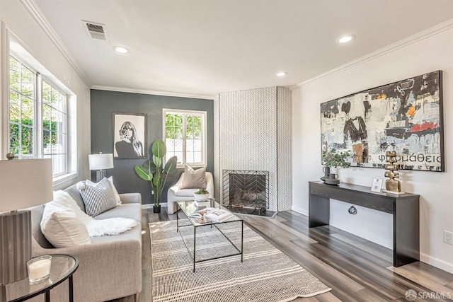 718 Whipple Ave, Redwood City, CA 94063 - living room with crown molding, wood finished floors, a fireplace, recessed lighting, and baseboards