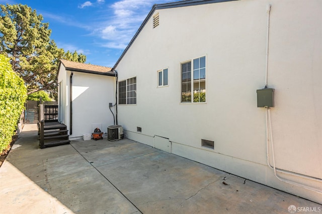 718 Whipple Ave, Redwood City, CA 94063 - view of side of property featuring crawl space, stucco siding, and a patio
