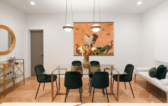 dining room with parquet flooring