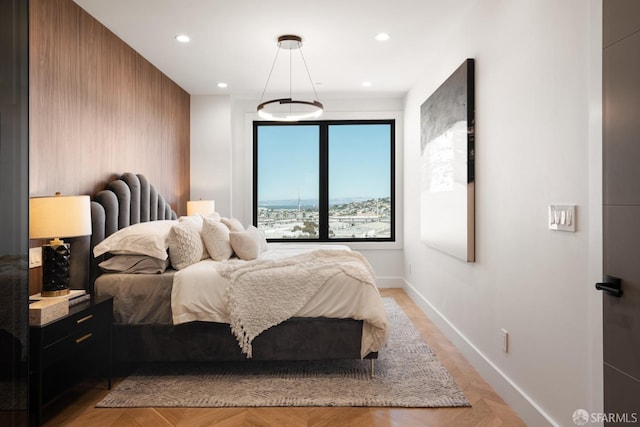 bedroom featuring light parquet flooring