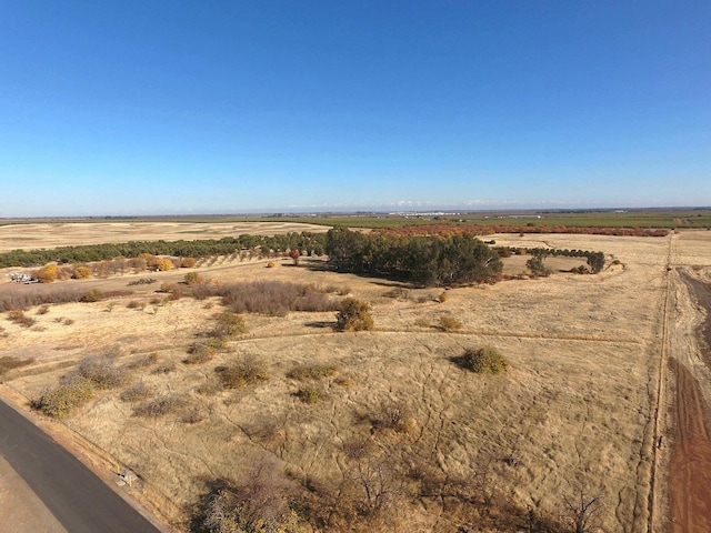 birds eye view of property featuring a rural view