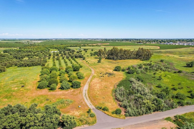 birds eye view of property featuring a rural view