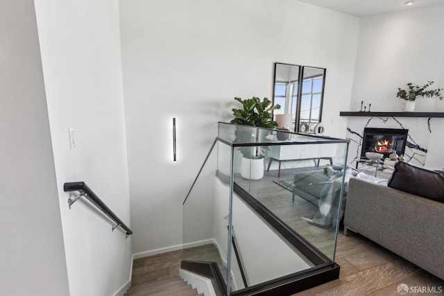 608 Missouri St Unit A, San Francisco, CA 94107 - stairs with wood finished floors, a premium fireplace, and baseboards