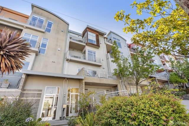 608 Missouri St Unit A, San Francisco, CA 94107 - back of house with stucco siding and stone siding