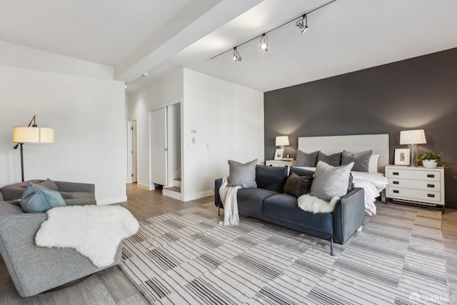 608 Missouri St Unit A, San Francisco, CA 94107 - bedroom featuring wood finished floors, rail lighting, and baseboards