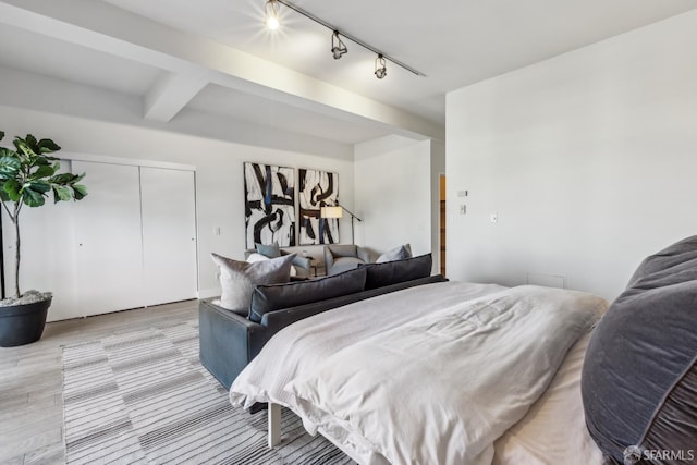 608 Missouri St Unit A, San Francisco, CA 94107 - bedroom featuring track lighting, light wood-style flooring, a closet, and beam ceiling