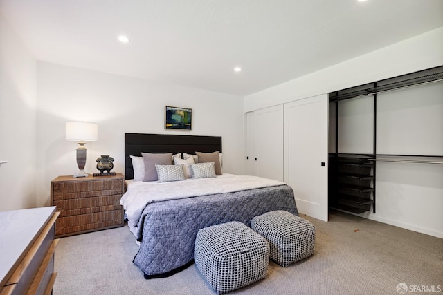 2464 Alida St, Oakland, CA 95602 - bedroom featuring light carpet, recessed lighting, and two closets