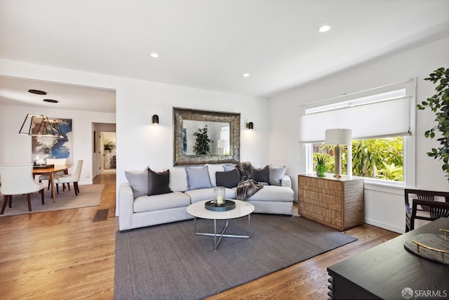 2464 Alida St, Oakland, CA 95602 - living area with light wood-style floors and recessed lighting
