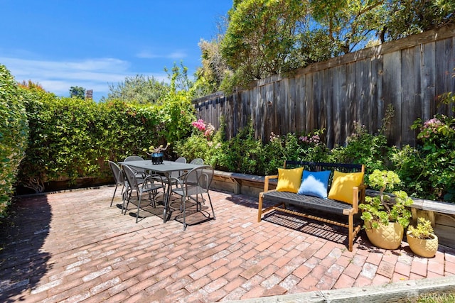 2464 Alida St, Oakland, CA 95602 - fenced backyard featuring a patio and outdoor dining area
