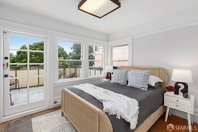 bedroom featuring wood finished floors