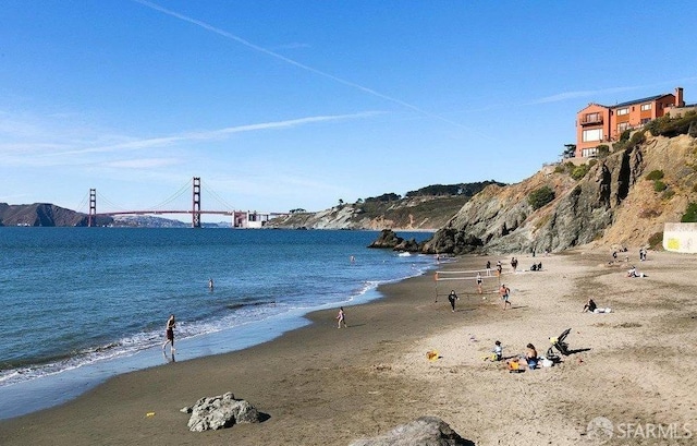 property view of water featuring a beach view