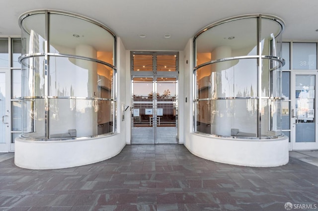 bathroom featuring floor to ceiling windows