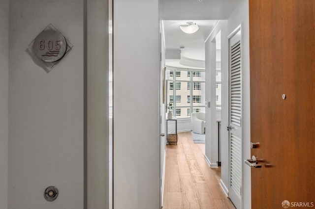 hallway featuring light wood-type flooring