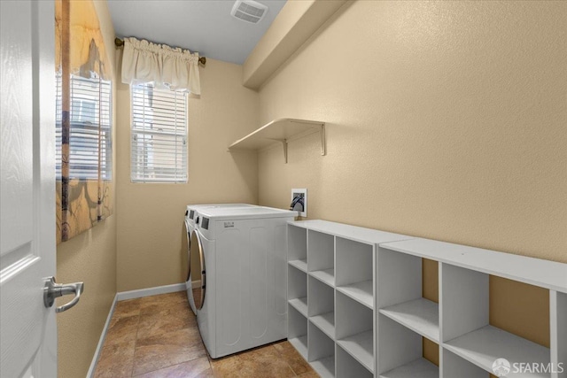 41008 Asilomar Ter, Fremont, CA 94538 - clothes washing area featuring hookup for a washing machine, baseboards, and stone finish floors
