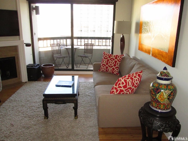 601 Van Ness Ave Unit 1102, San Francisco, CA 94102 - living area with healthy amount of natural light, wood finished floors, and a fireplace with flush hearth
