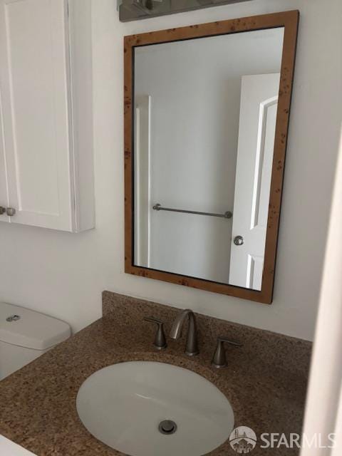 601 Van Ness Ave Unit 1102, San Francisco, CA 94102 - half bathroom featuring vanity and toilet