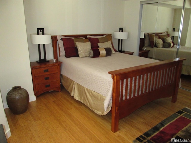 601 Van Ness Ave Unit 1102, San Francisco, CA 94102 - bedroom with wood finished floors and a closet