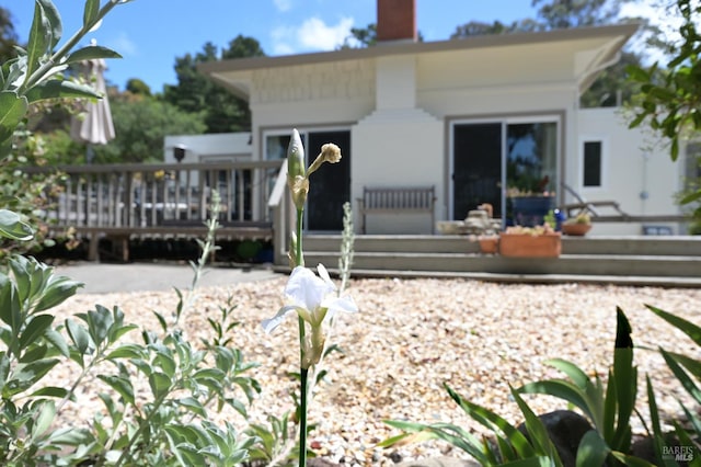 233 Prince Royal Dr, Corte Madera, CA 94925 - back of property with a wooden deck and a chimney