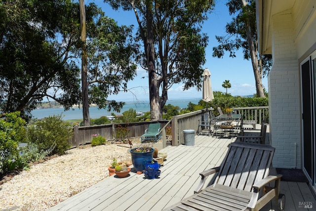 233 Prince Royal Dr, Corte Madera, CA 94925 - wooden terrace featuring outdoor dining space, a water view, and a fenced backyard