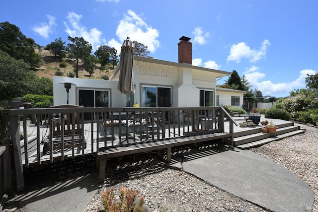 233 Prince Royal Dr, Corte Madera, CA 94925 - back of house featuring a deck, a chimney, and brick siding