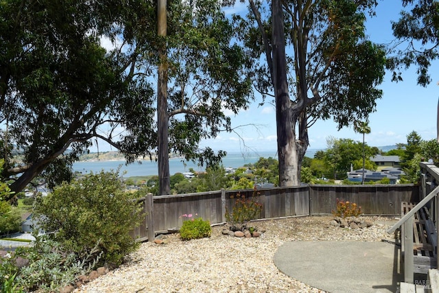 233 Prince Royal Dr, Corte Madera, CA 94925 - fenced backyard with a water view and a patio area