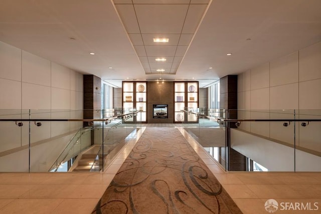 hallway with light tile patterned floors