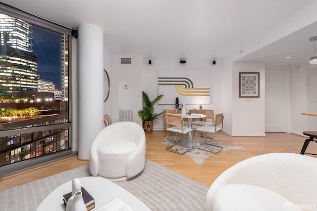 living room with hardwood / wood-style floors