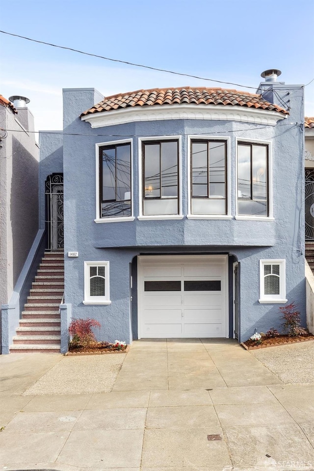 view of front of house with a garage