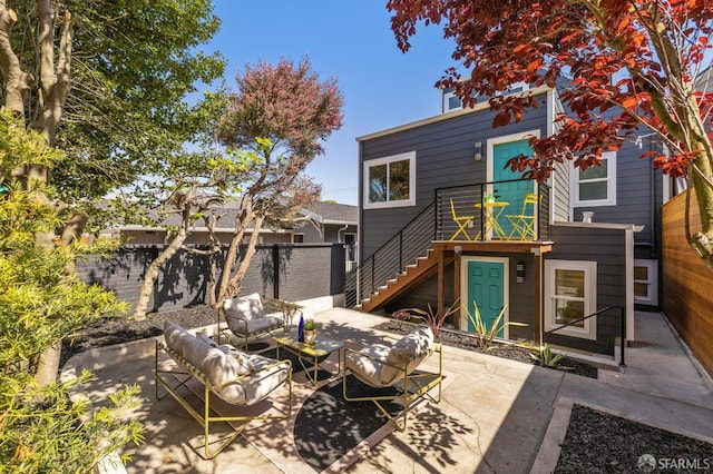 57 Niagara Ave, San Francisco, CA 94112 - rear view of property with stairs, outdoor lounge area, and a patio area